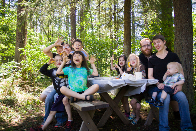 Silly group photo at picnic table